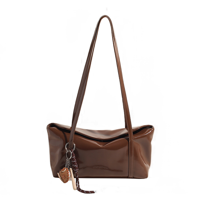 A new Korean version of a niche underarm bag for women in 2025, a trendy and retro hand-held commuter bag with a simple and large-capacity single-shoulder bag Item Picture