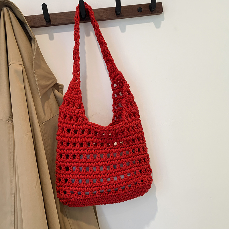 A large-capacity commuting woven bag for women, a new retro hollowed-out knitted bag with a relaxed grid beach bag details Picture