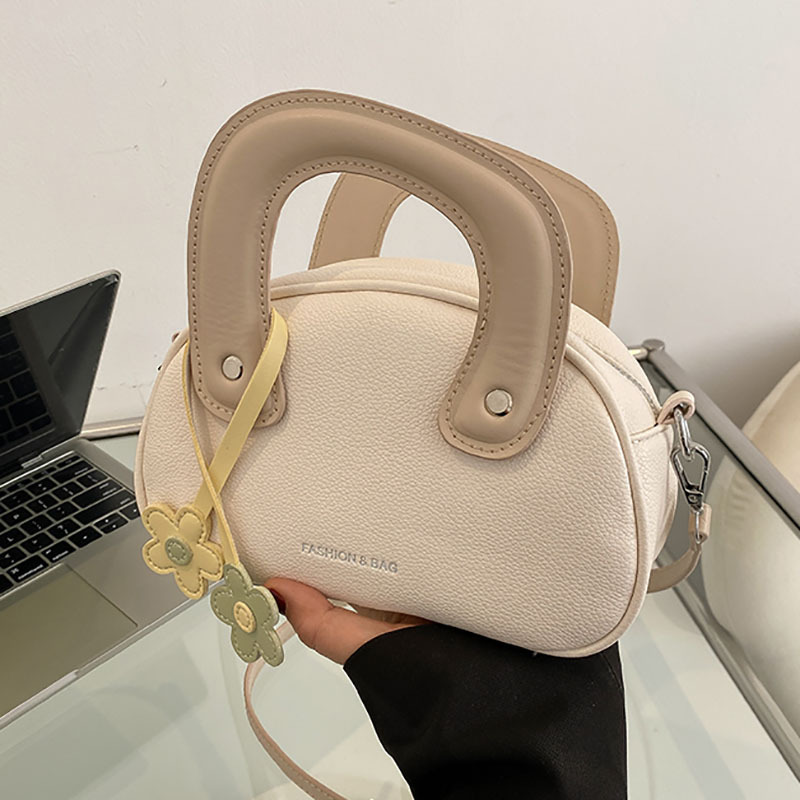Candy-colored hand-held small bag for women, 2024 new style, fresh and simple hand-held round bag with contrasting colors, high-quality single-shoulder crossbody bag details Picture