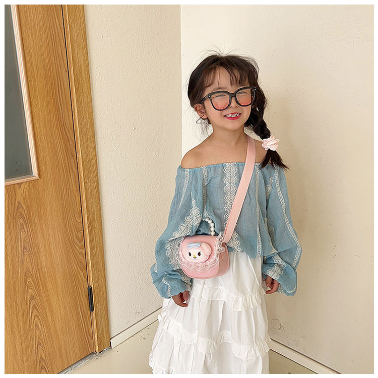 Wholesale cartoon pearl hand-held children's bags, new Melody Princess single-shoulder crossbody webbing bag, parent-child coin purse details Picture