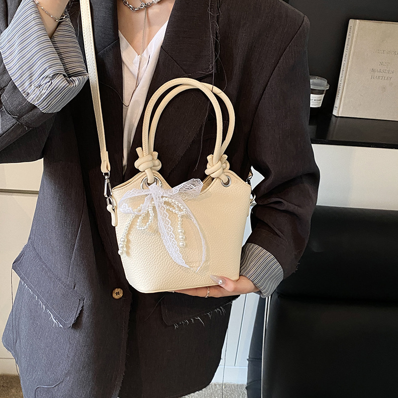 Fashionable solid color simple hand-held bucket bag for women, 2025 new Korean style Instagram single-shoulder bag, trendy and casual crossbody bag Specification drawing