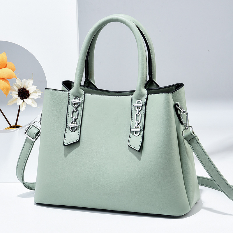 The 2025 new color-blocking women's bag is a streetwear, fashionable and simple women's hand-held shoulder bag Application Scenario