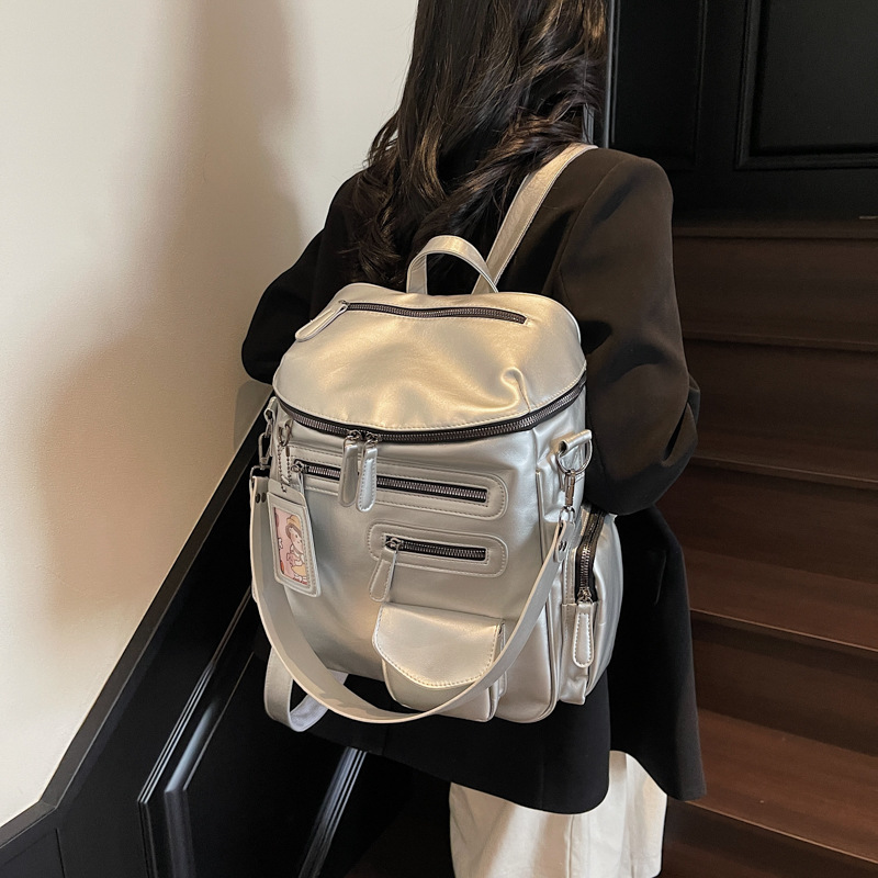 A trendy motorcycle backpack for girls in 2025, a new multi-pocket zipper backpack for college students' school bags details Picture