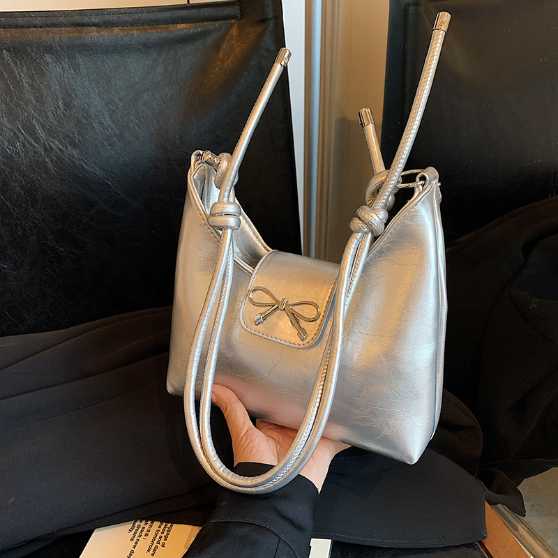 2024 New autumn bow fashion single-shoulder bag, simple crossbody bag, women's quality and fashionable commuting bag full figure