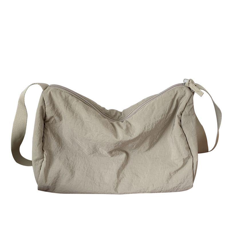 Convenient large-capacity soft cloth bag, simple cloth bag, single-shoulder bag, women's crossbody bag, Japanese-style cylindrical bag, student class bag for women Item Picture