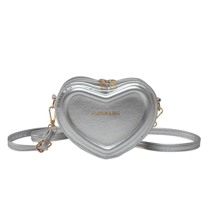 The new Korean version of the women's heart-shaped single-shoulder bag features a unique design and a high-end underarm bag. It is a niche PU fashionable crossbody bag for women Item Picture