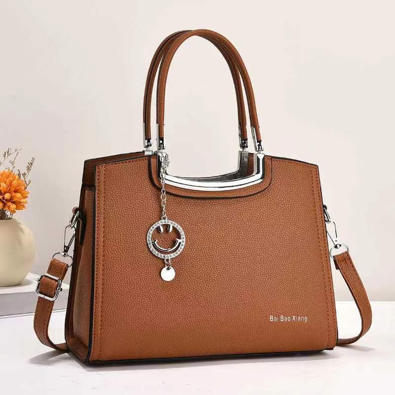 The new macaron handbag is a fashionable and trendy cross-border versatile women's bag with a high-end feel. It features a large capacity single-shoulder bag and a crossbody bag Specification drawing