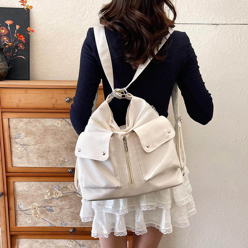 This is a new lightweight and casual single-shoulder bag with a large capacity of water-resistant nylon fabric. It is a simple, fashionable and versatile crossbody bag for women full figure