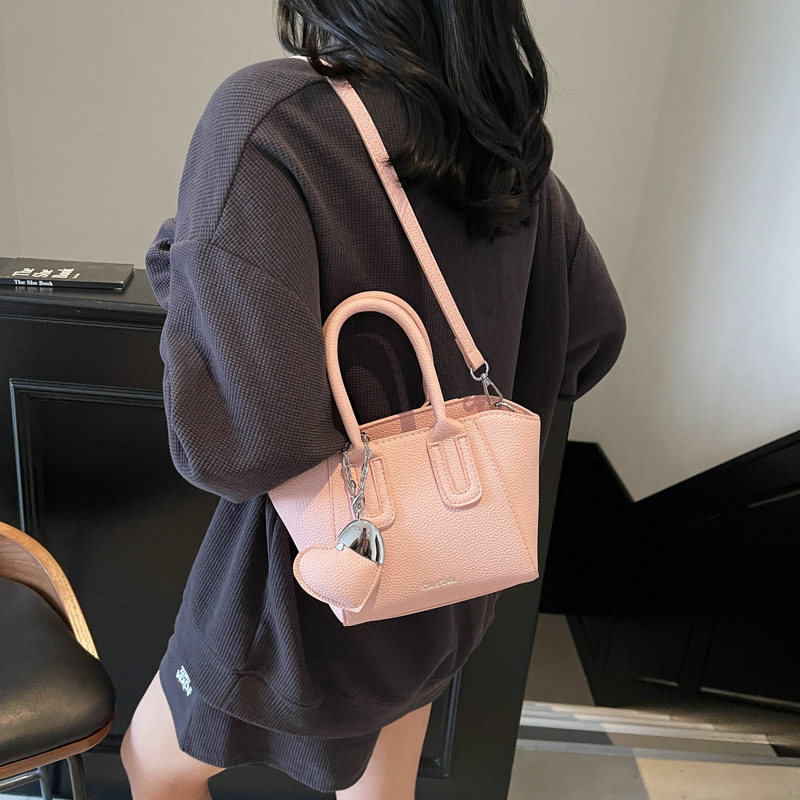 Lychee-patterned hand-held fashionable bucket bag for women, 2025 new retro single-shoulder bag, niche quality commuter crossbody bag for women details Picture