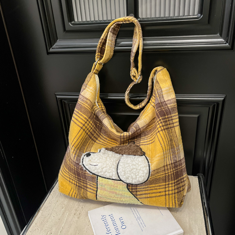 The 2025 new style of checkered bag for women, a laid-back single-shoulder bag with a large capacity tote bag, is suitable for class and commuting full figure