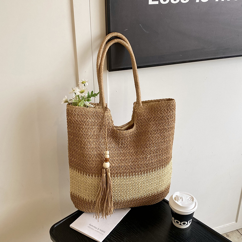 Seaside beach vacation straw woven bag for women 2025 New style hollowed-out color-blocked single-shoulder bag with tassels and large capacity bucket bag Specification drawing