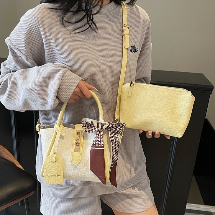 2025 New retro, light luxury, simple and large-capacity hand-held bucket bag for women, high-end texture, single-shoulder crossbody bag for mother and child full figure