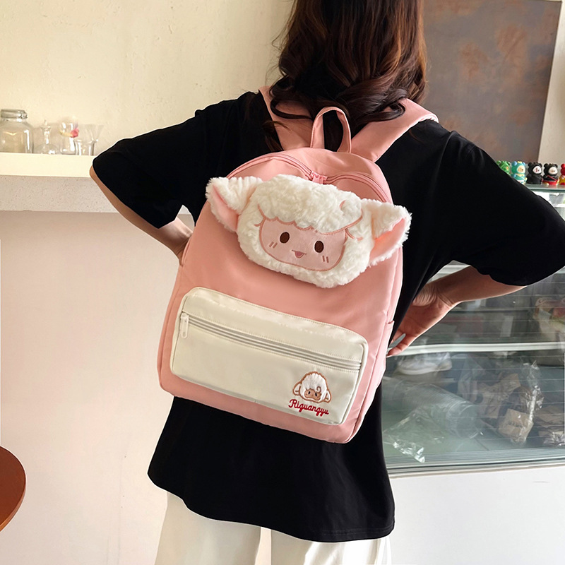 The new cartoon bear canvas backpack is cute and has a large capacity. It's a student class backpack with a girlish heart and a little lamb style Application Scenario