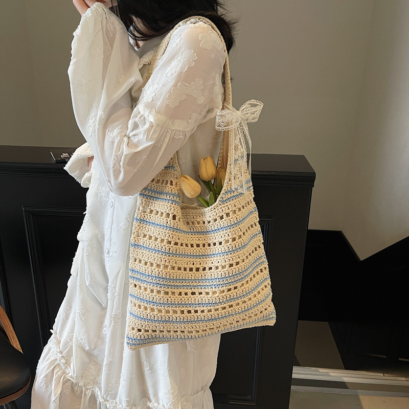 Casual large-capacity bucket bag for women 2025 summer, new knitted hollowed-out underarm bag, striped versatile commuter single-shoulder bag details Picture