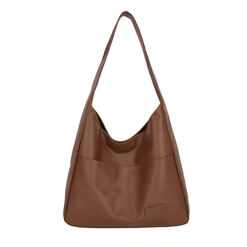 Fashionable and simple single-shoulder bag 2025 Spring New niche trendy handbag, casual and trendy large-capacity tote bag Item Picture