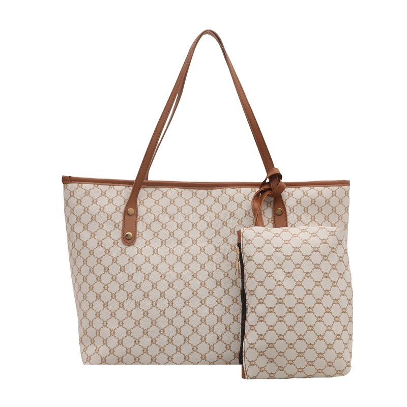 This large-capacity women's 2025 new single-shoulder bag combines the ancient checkered pattern tote bag with a simple and elegant look. It's a mother-and-child bag Item Picture
