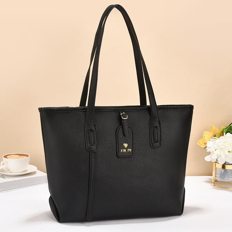 The new printed checkered bucket bag is a cross-border fashion handbag that is versatile, has a large capacity and a high-end feel. It is a single-shoulder crossbody bag full figure