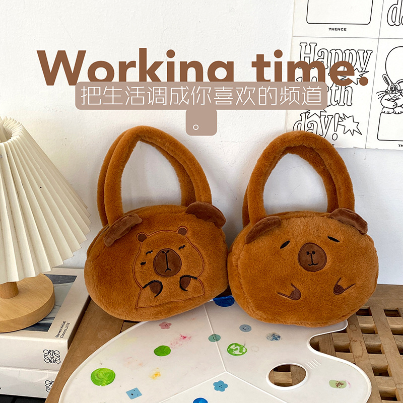 Direct sales from the manufacturer of cartoon Kapibara Capybara plush bags, cute dolls, loose change children's claw machine bags details Picture