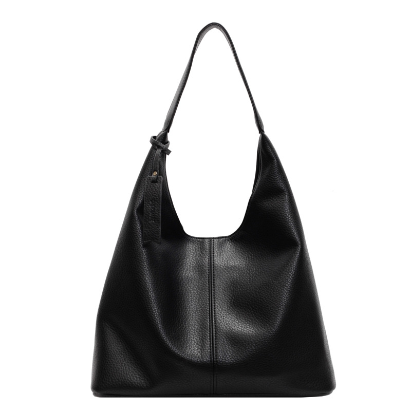 A new 2024 stylish single-shoulder bag for women with large bags, featuring an ins niche design and a large-capacity leopard print commuter tote bag Item Picture