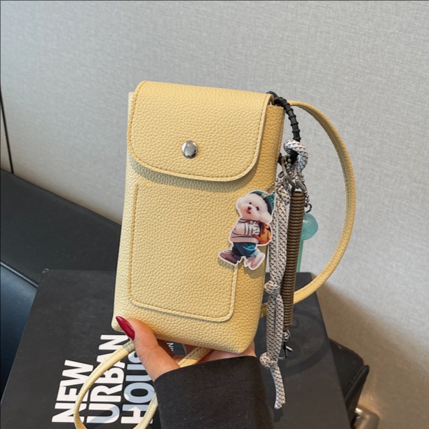 The 2025 new vertical fashion bag with lychee pattern and soft leather texture is a versatile and portable phone bag for walking full figure