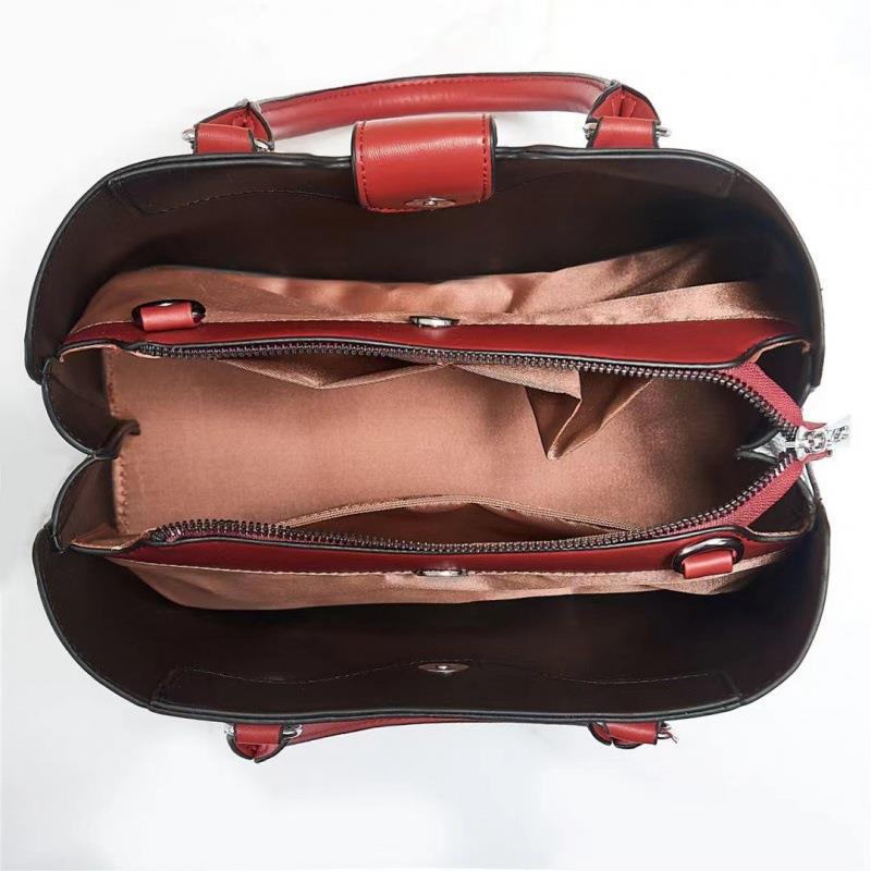 Wholesale of women's bags 2022 new style embossed bags, European and American fashion lace pattern single-shoulder hand-carry crossbody bags, export consignment Item Picture