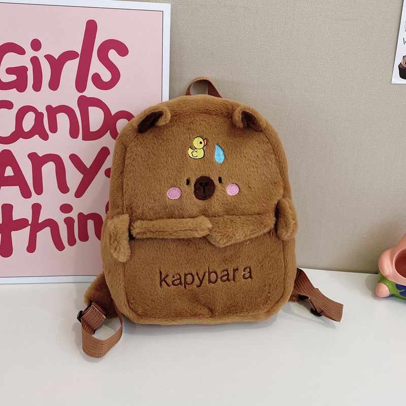 The 2025 new Capibara plush Capybara backpack is cute and versatile. It features a plush bag and a cartoon student mini backpack for girls details Picture