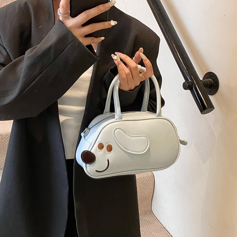 A niche design with a fun Dachshund handbag for women in 2025, a new retro and simple solid color single-shoulder crossbody bag details Picture
