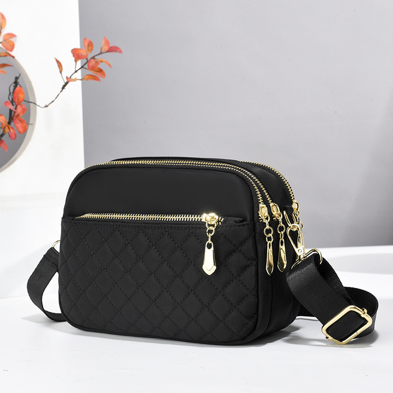 The new 2025 diamond-shaped mini crossbody single-shoulder women's mobile phone bag is a fashionable and trendy sports bag for women full figure