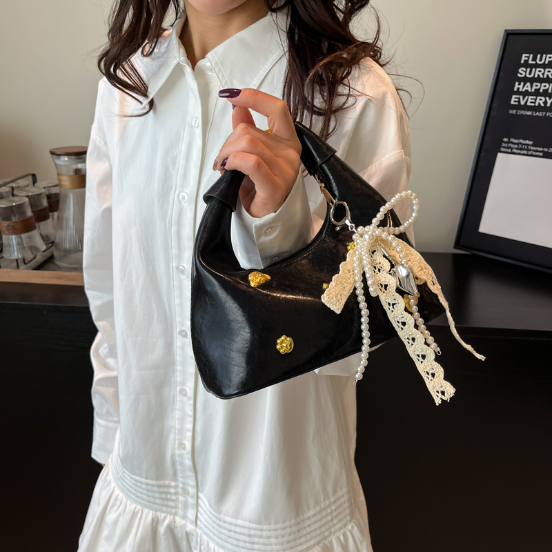 Korean style simple and fashionable baguette bag for women 2025 new style, sweet and stylish bow single-shoulder crossbody bag details Picture