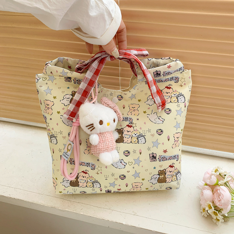 2025 New style girl cat handbag, cute floral print hand-held bag, niche printed versatile commuter bento bag full figure