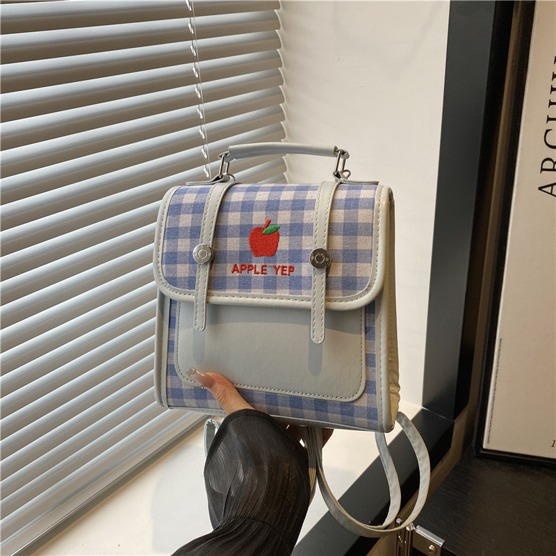 Japanese-style niche design checkered small backpack, lightweight and multi-functional crossbody bag, fresh and clean school style bag full figure