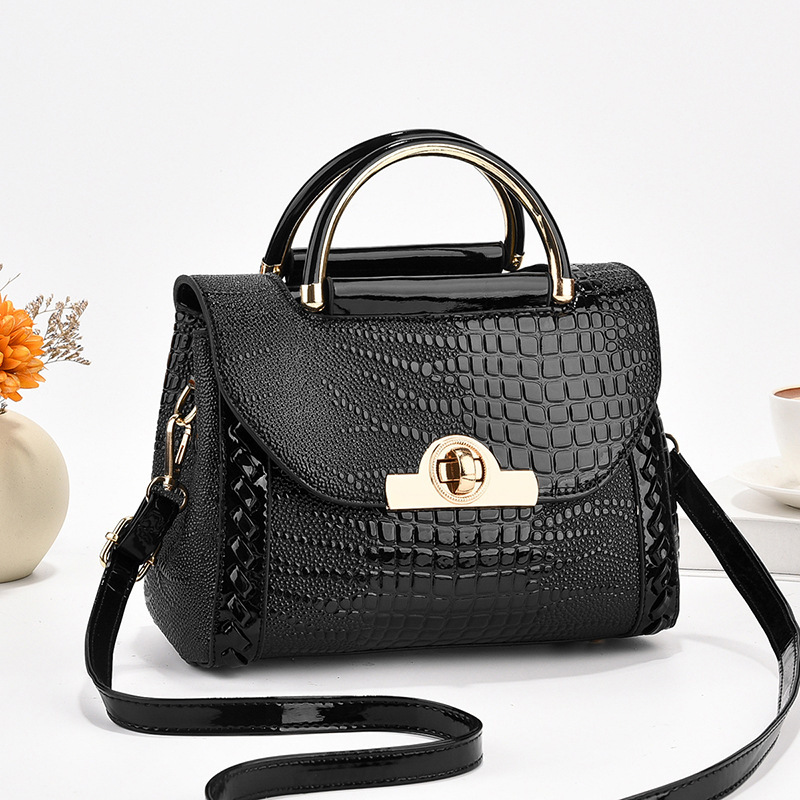 A new 2023 trendy spring/Summer women's bag with unique printed Korean style, a popular single-shoulder, crossbody and hand-held small square bag on Instagram full figure