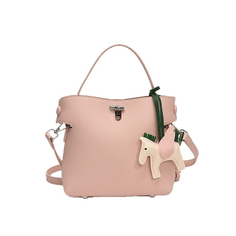 The 2025 new Korean-style high-end macaron hand-held small square bag is a versatile and fashionable single-shoulder crossbody bag for women's daily commuting Item Picture