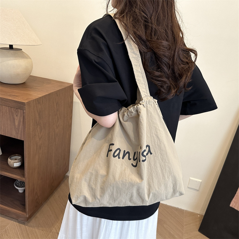Large-capacity bag for women, light and versatile, 2025 new casual canvas single-shoulder shopping bag, tote bag for school and commuting details Picture