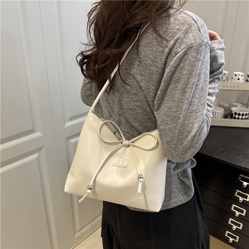 2025 Summer New style niche quality bucket bag for women, versatile and fashionable Japanese and Korean underarm single-shoulder bag, bow bag details Picture