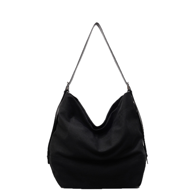 Korean solid color fashionable large-capacity bucket bag for women 2025 new style canvas student commuting single-shoulder crossbody bag Item Picture