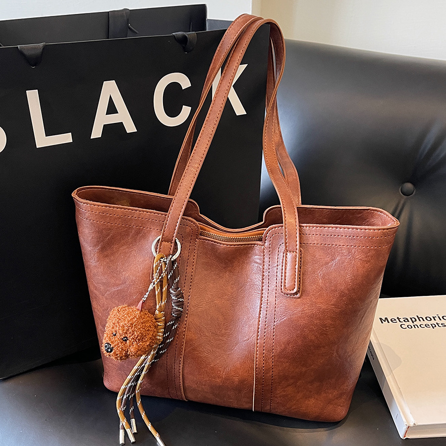 Simple and versatile women's large-capacity 2024 new casual single-shoulder shopping bag, fashionable commuter tote bag full figure