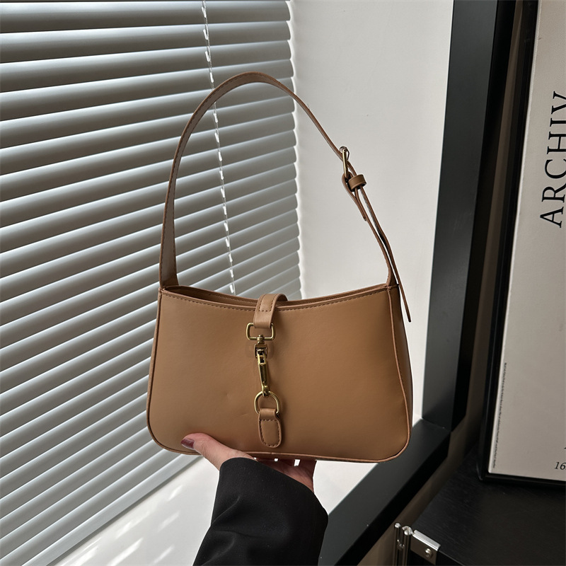 This is a new 2025 stylish and elegant single-shoulder crossbody bag with a solid color hook and a fresh underarm texture full figure