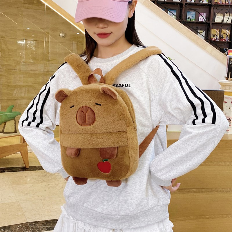 The new Capibara plush Capybara backpack is cute and versatile. It features a plush bag for girls and cartoon students, as well as a small cross-border backpack details Picture