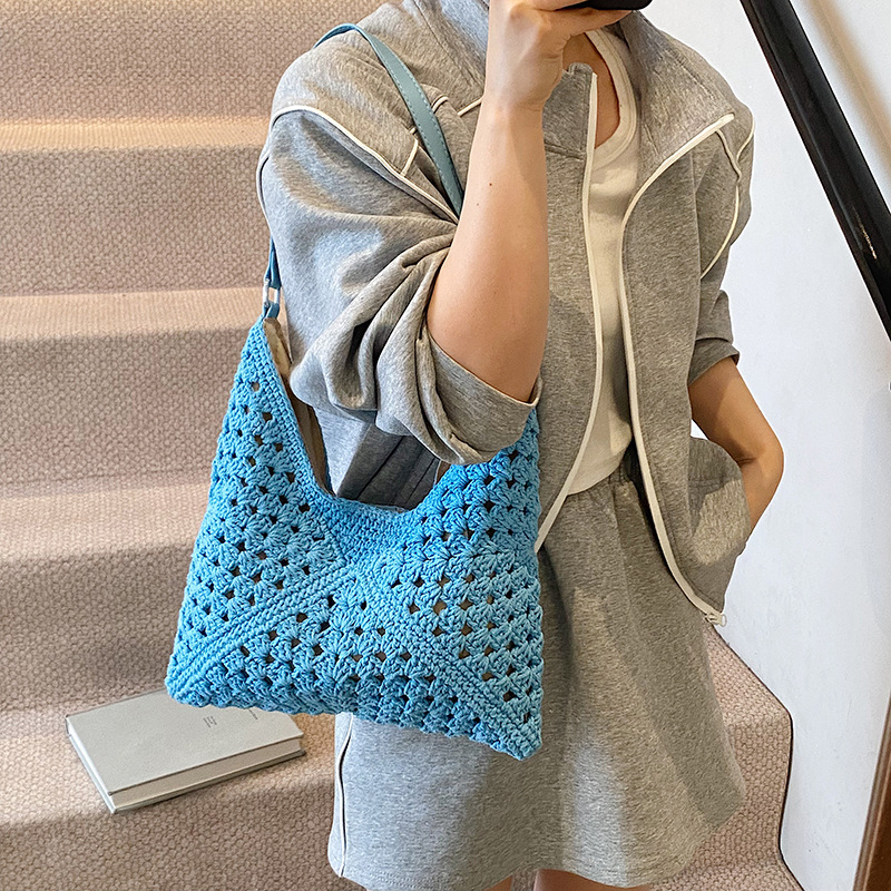 Hollowed-out best-selling woven large-capacity bucket bag for women 2025 new style seaside vacation beach straw woven versatile single-shoulder bag details Picture