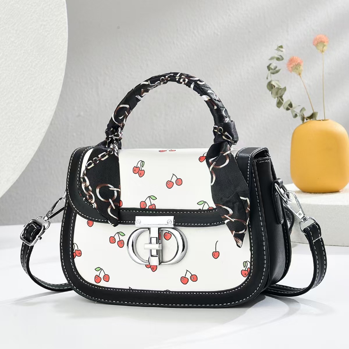 The new small cherry print fashionable handbag is a high-quality, stylish cross-border single-shoulder bag with a versatile and trendy crossbody style full figure