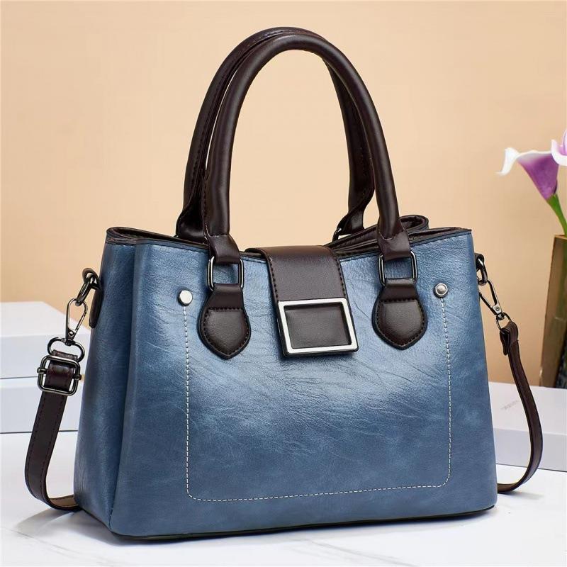 This is a new large-capacity single-shoulder crossbody women's bag for women made of retro material with contrasting colors. It has multiple layers and a high-quality texture full figure