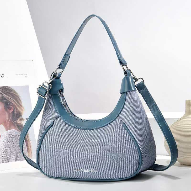 The new underarm handbag, the crescent-shaped women's bag, has a high appearance level. It is a cross-border versatile and fashionable single-shoulder bag and a trendy crossbody bag details Picture