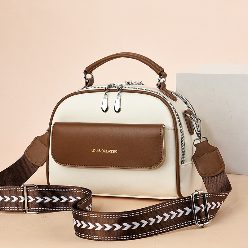 The new 2025 trendy women's bag, a Korean-style single-shoulder crossbody bag with contrasting colors, is a simple and elegant women's pillow bag full figure