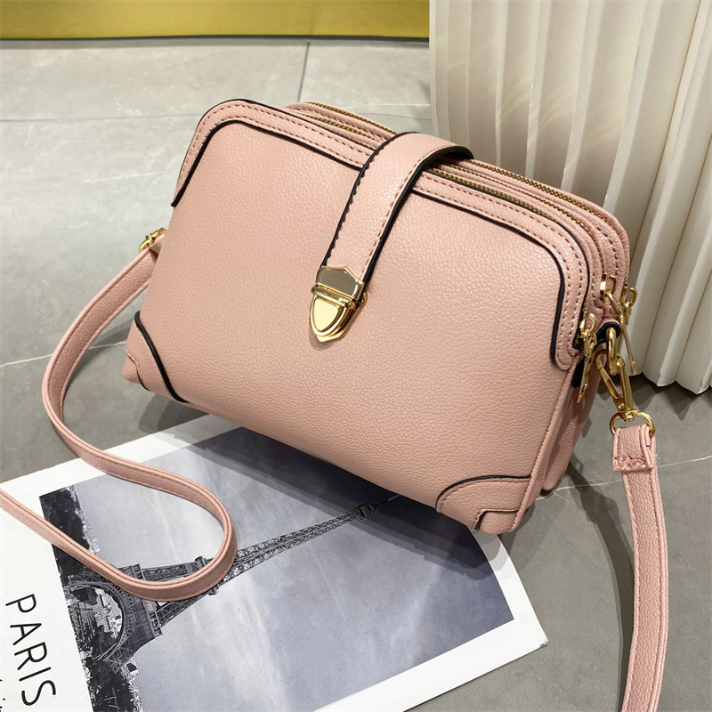 2023 New solid-color multi-layer spliced soft leather large-capacity single-shoulder crossbody simple cross-border women's small bag full figure