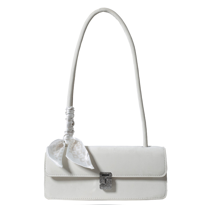 The 2024 new silver single-shoulder bag for French niche women is in vogue this year. The textured underarm baguette bag is also popular Item Picture