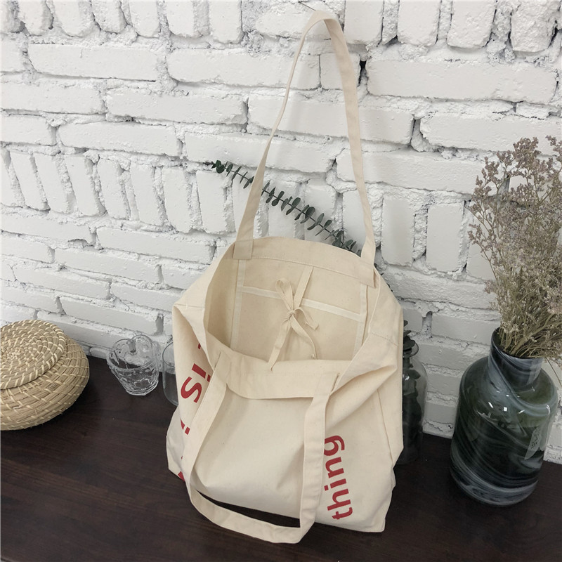 E115 Korean large-capacity single-shoulder bag ulzzang Harajuku simple student canvas bag hand-held shopping bag large bag Application Scenario