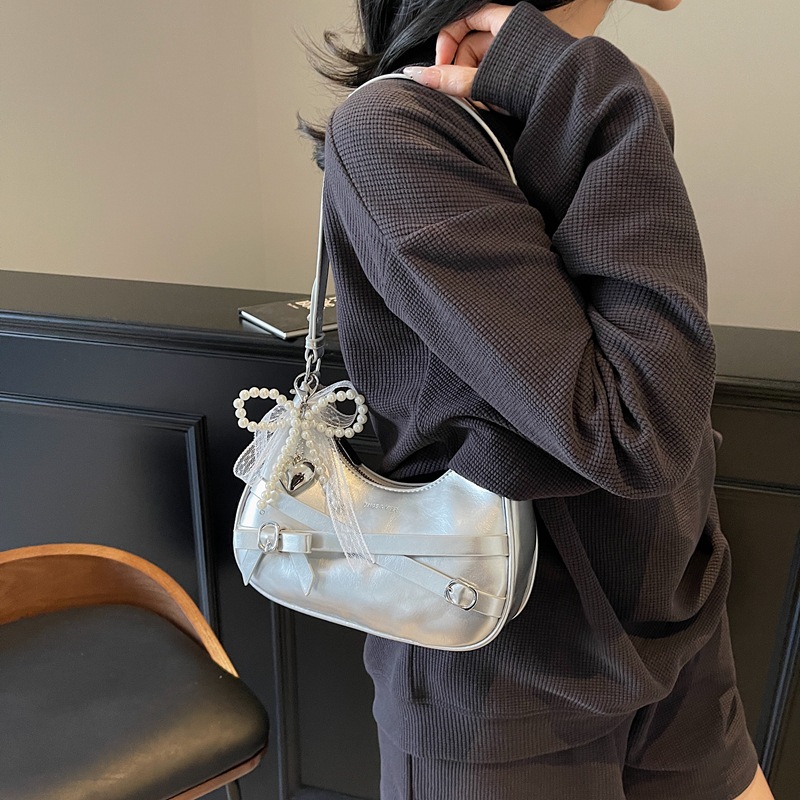 A niche oil wax leather small bag for women, a new summer fashion lace bow underarm bag with a high-quality crossbody details Picture