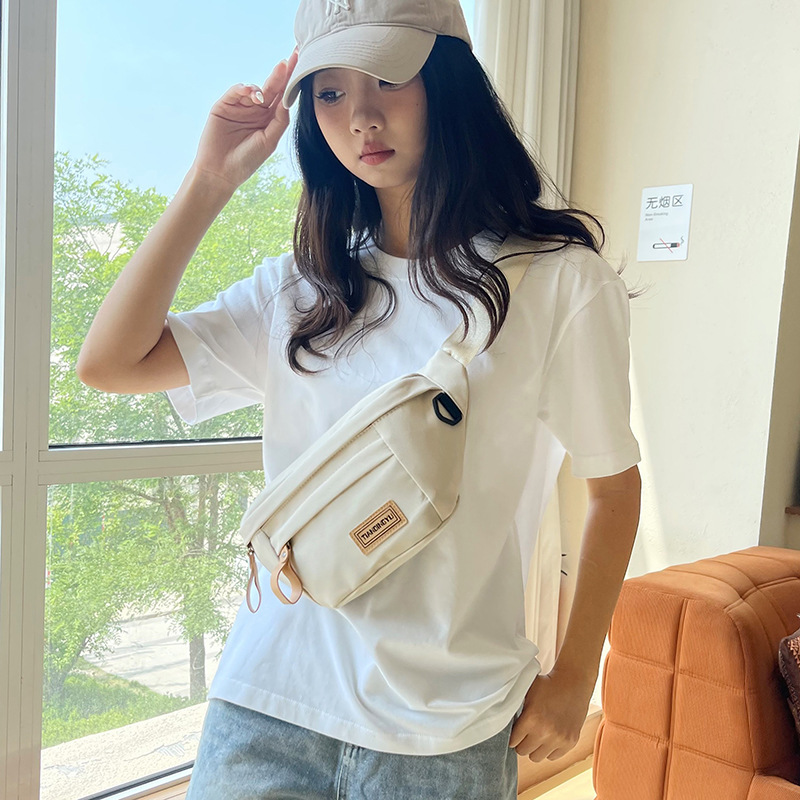 Sporty solid color simple saddle bag 2025 summer new outdoor sports crossbody small bag, loose change mobile phone bag details Picture