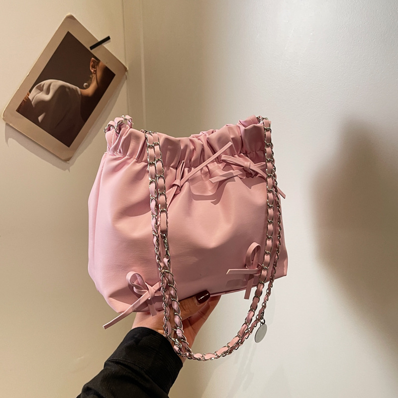 A niche pleated design hand-held small bag for women, a simple bucket bag and a fashionable crossbody bag for spring and summer 2024 full figure